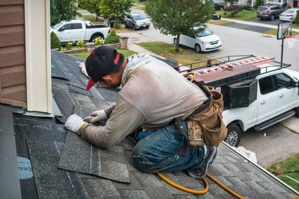 Professional Roofing technician working in Pickett, WI